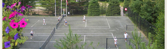 Retreat Guest Practicing their Tennis Game