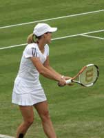 Henin Gets Ready to Serve at the Wimbledon Championships